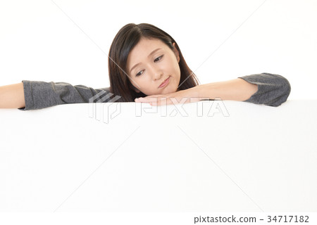 Woman with a tired look Woman with a tired look 34717182