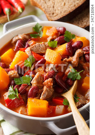 Pumpkin chili soup with beef and beans in tomato Pumpkin chili soup with beef and beans in tomato 34718064