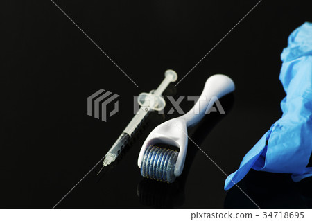 Dermaroller for medical micro needling therapy. 34718695