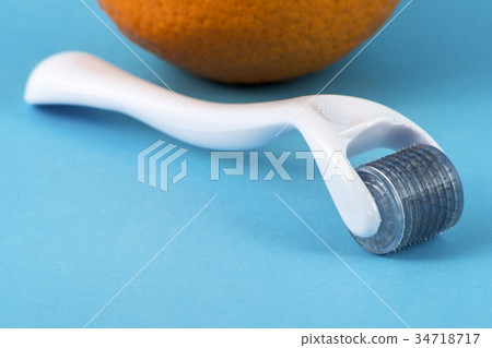 Dermaroller for medical micro needling therapy. 34718717