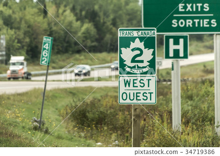 Signpost with green sign of Trans Canada 2 Highway Signpost with green sign of Trans Canada 2 Highway 34719386