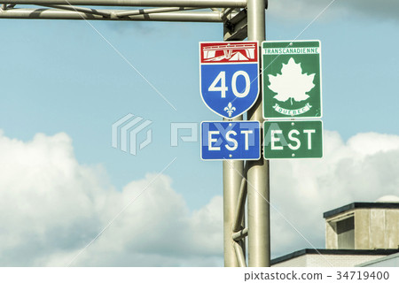 Signpost with green sign of Trans Canada Highway 34719400