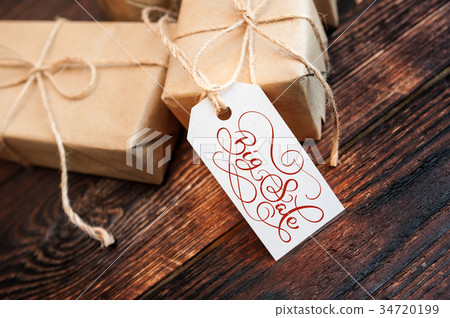 Two gift boxes and tag with Big Sale text on kraft Two gift boxes and tag with Big Sale text on kraft 34720199