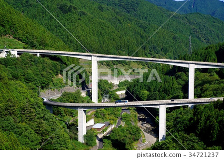 Mountain, valley and loop bridge Rokuden bridge Rokugi bridge d seen from Oku Chichibu dam 34721237