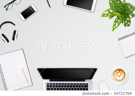 Modern workspace with laptop tablet, smartphone  34722764