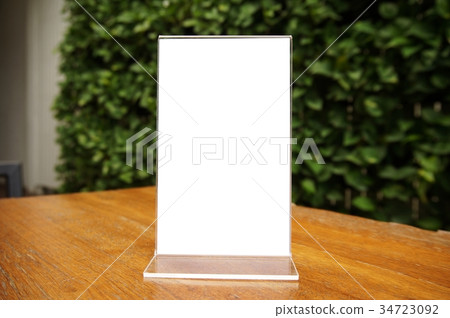 Mock up Menu frame standing on wood table  34723092