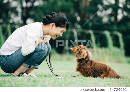 Miniature Dax and Owner Women Miniature Dax and Owner Women 34724061