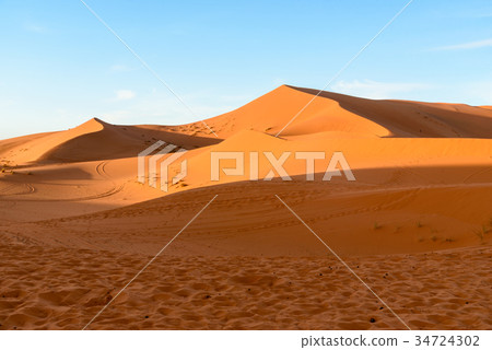 Erg Chebbi Sand dunes near Merzouga, Morocco Erg Chebbi Sand dunes near Merzouga, Morocco 34724302
