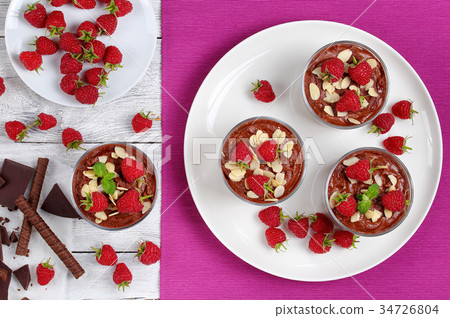 chocolate mousse in cups on table 34726804