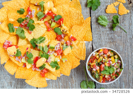 Yellow corn chips nachos 34728526