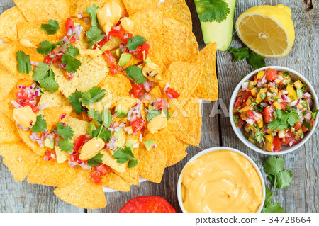Yellow corn chips nachos Yellow corn chips nachos 34728664