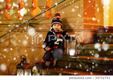 Little cute kid boy with with a light lantern on Little cute kid boy with with a light lantern on 34732741