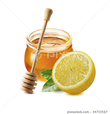 Honey jar, wooden dipper, lemon pieces isolated Honey jar, wooden dipper, lemon pieces isolated 34733587