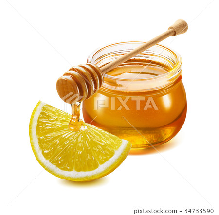 Honey drink with lemon isolated 34733590