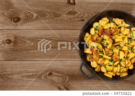 Potatoes On Dark Background Potatoes On Dark Background 34733822