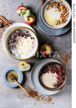 Variety bowls of porrige 34734776