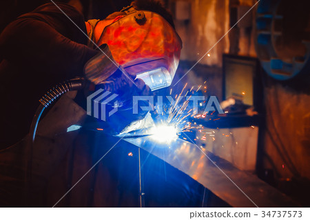 Metal Welding with sparks and smoke Metal Welding with sparks and smoke 34737573