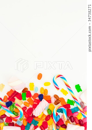 Assorted colorful bright candies on white 34738271