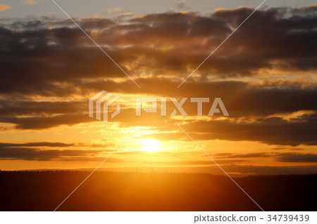 Beautiful bright sunset photo 34739439