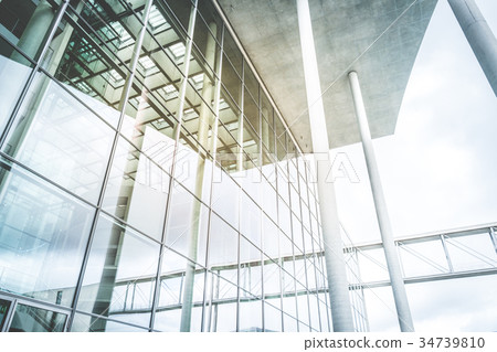 Modern architecture, glass facade reflections 34739810
