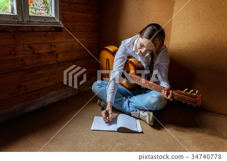girl with a guitar who writes a song girl with a guitar who writes a song 34740778