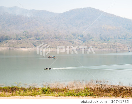 Fishing boat in Thailand lake,summer season Fishing boat in Thailand lake,summer season 34741785