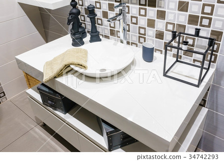 Interior of bathroom with sink basin faucet  34742293