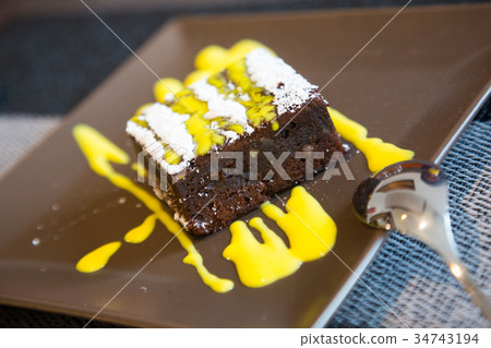 chocolate brownie in cafe 34743194