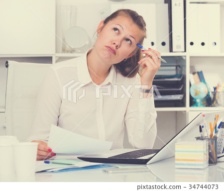 Office manager woman is having complicated issue with project 34744073