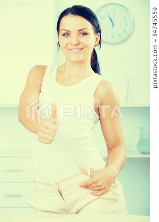 Young brunette woman 34745559