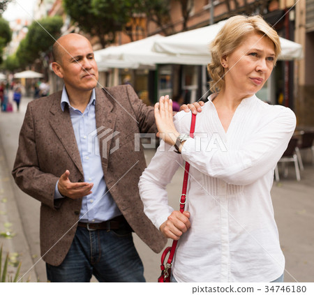 angry woman outdoors 34746180