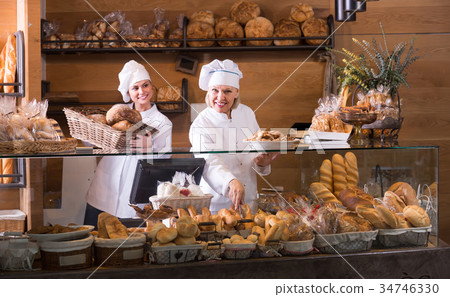 Smiling women at bakery. 34746330