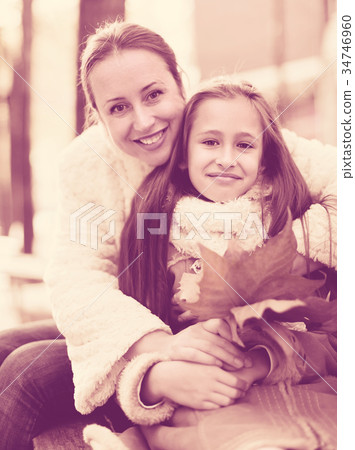 Happy woman with daughter 34746960
