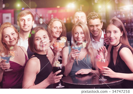 Young people are resting and drinking cocktails Young people are resting and drinking cocktails 34747258
