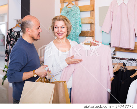 spouses buying new dress 34747775