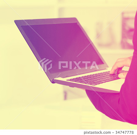 Businessman using laptop Businessman using laptop 34747778