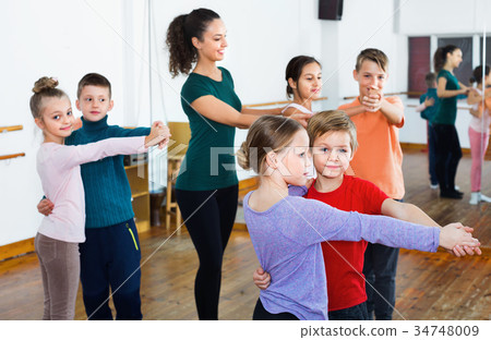 Children studying of partner dance at dance school 34748009