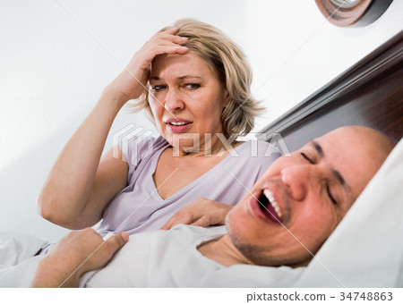Mature evil woman disturbed with partner snores 34748863
