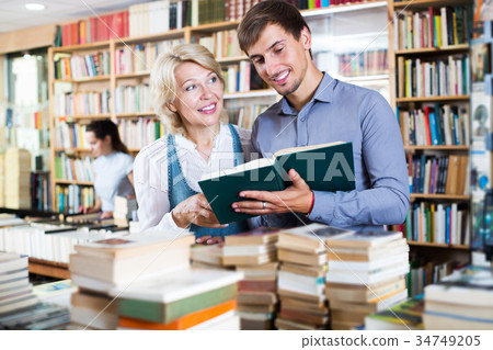Woman and man having books 34749205