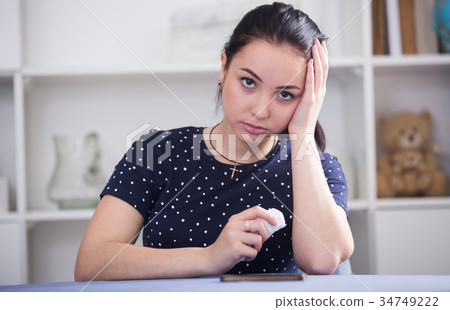 Woman waiting for phone call 34749222