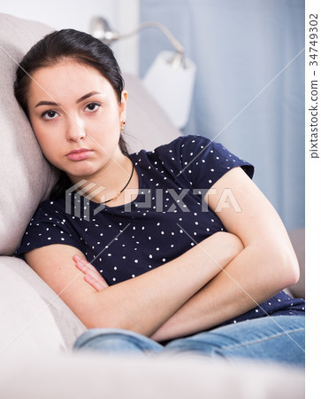 Offended girl at home 34749302