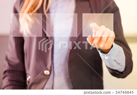 Woman touching screen Woman touching screen 34749845