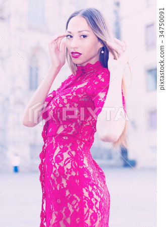 close-up portrait of young slim adult girl in sexy evening apparel 34750091