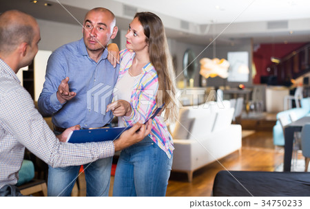 Family is unpleasantly surprised by prices for furniture Family is unpleasantly surprised by prices for furniture 34750233