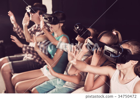 Family satisfied video in room of virtual reality 34750472