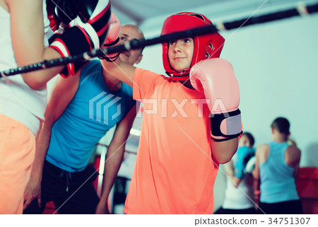 Children training on boxing ring Children training on boxing ring 34751307