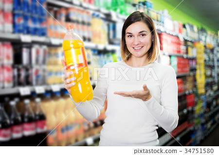 female shopper searching for beverages 34751580
