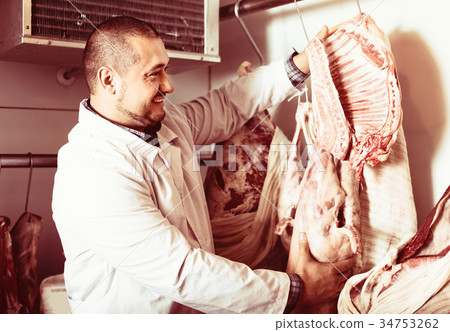 staff selling halal meat staff selling halal meat 34753262