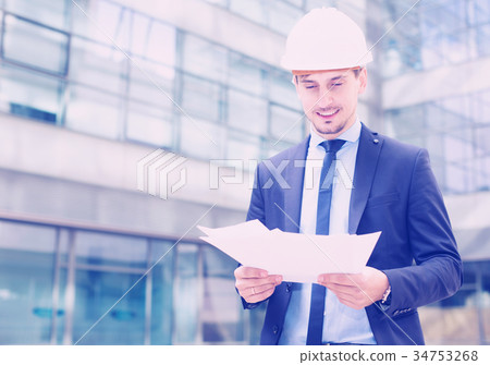 Portrait of cheerful man working outdoors Portrait of cheerful man working outdoors 34753268