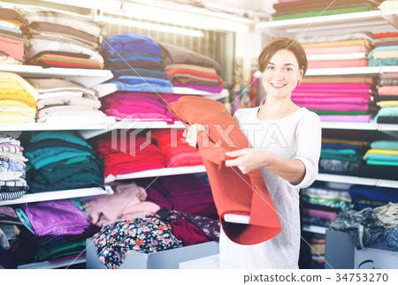 Woman choosing fabric 34753270